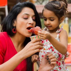 mother and daughter eating ice cream